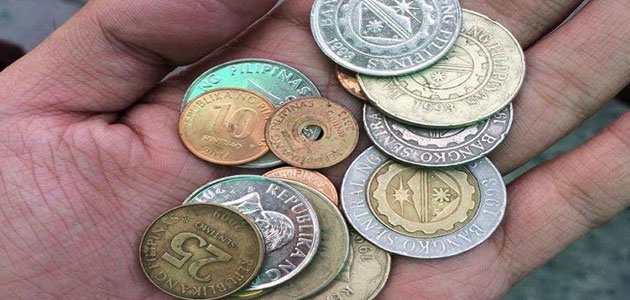 تفسير إعطاء الميت نقود معدنية